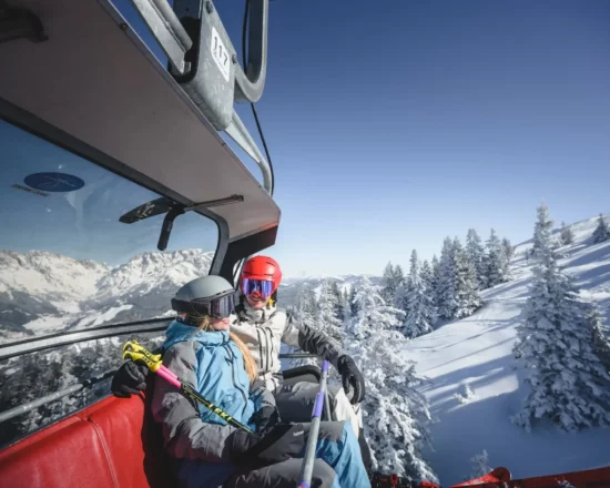 Photo of a couple on the chairlift